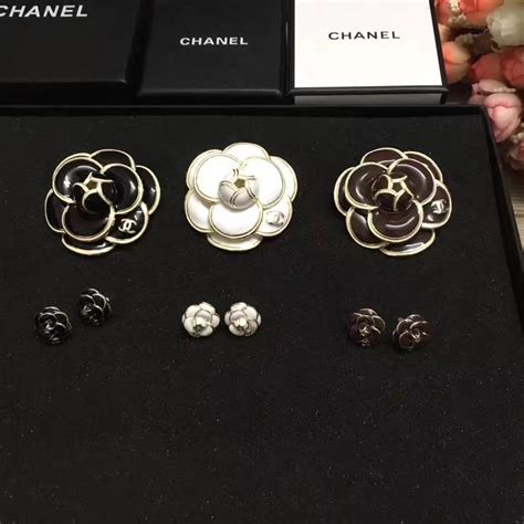 sautoir style chanel|Chanel camellia flower brooch.